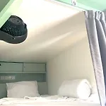 Urban Habitat Capsule Beds Hostel *